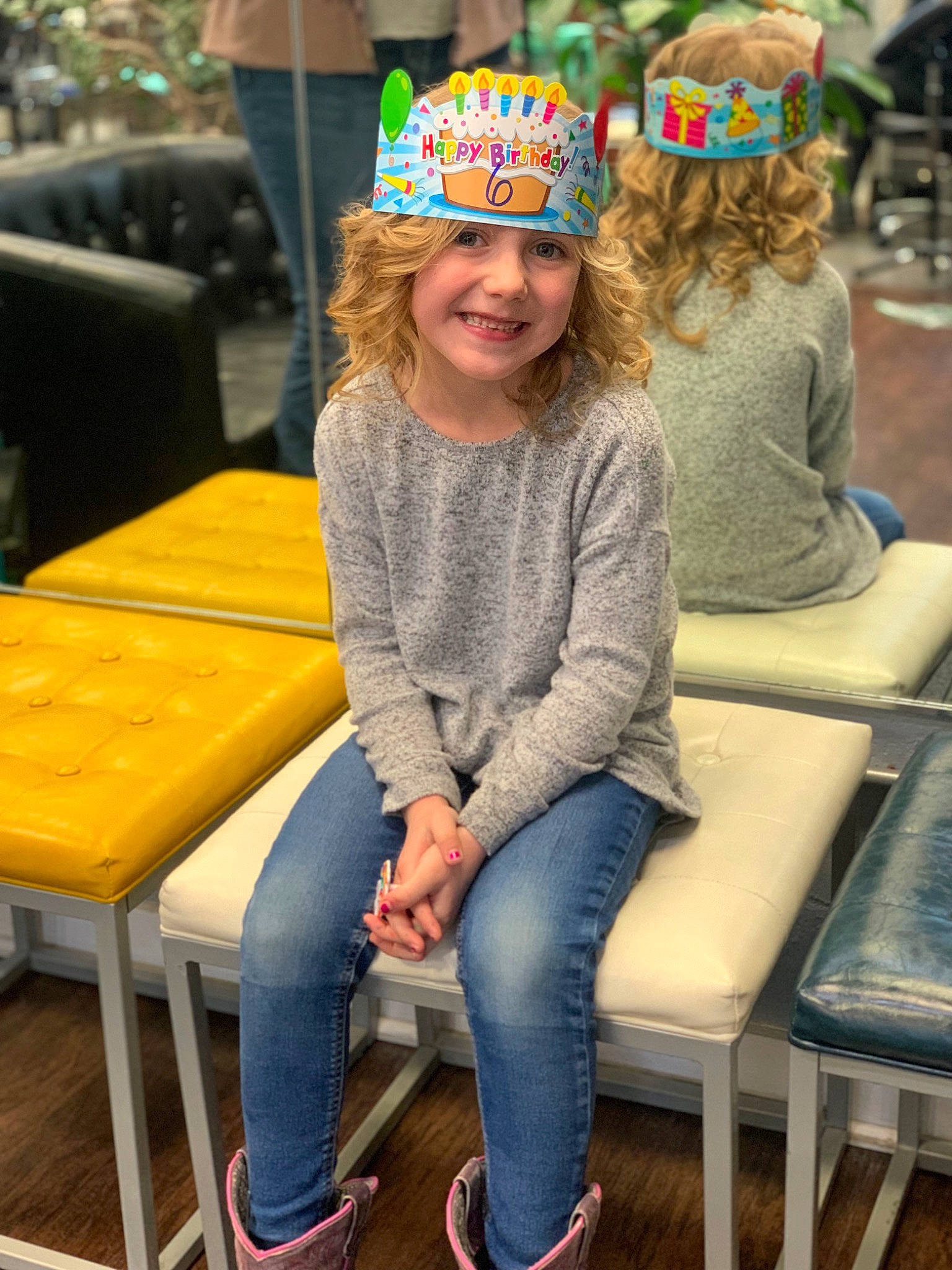 Brailynn is registered to the contest to win money with this photo: blond, chair, child, city, electric_blue, event, fashion, fashion_accessory, fun, hairstyle, happy, headwear, holiday, human_leg, jeans, joy, knee, leisure, person, recreation
