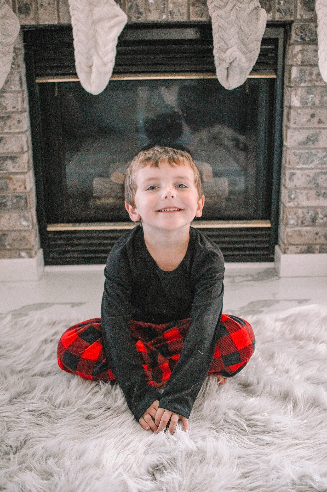 Easton is registered to the contest to win money with this photo: child, flash_photography, flooring, fun, fur, grass, grey, happy, human, joy, pattern, person, red, sitting, smile, standing, toddler, tree, vacation, window