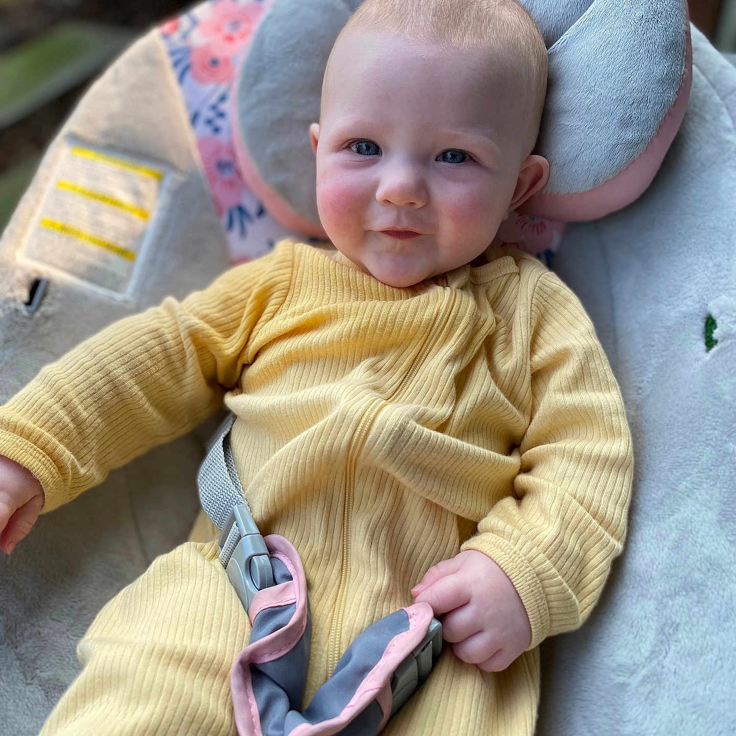 Ella joined the competition — help win amazing prizes! baby, bodypart, clothing, coat, cushion, face, finger, furniture, hand, happy, head, homedecor, jacket, knitwear, pants, person, photography, portrait, sitting, sweater