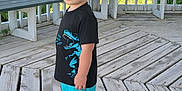 Noah joined the competition — help win amazing prizes! bench, boy, casual_clothing, child, daylight, dinosaur_graphic, gazebo, greenery, outdoor, shade, shorts, side_view, sneakers, standing, summer, sunglasses, trees, tshirt, wooden_deck, young_child