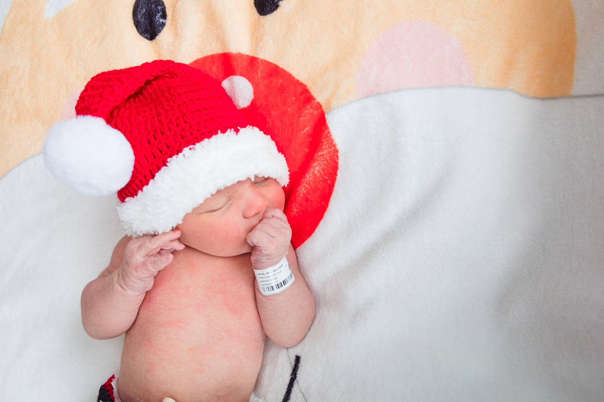 Nico joined the competition — help win amazing prizes! baby, baby_products, baby_sleeping, baby_toddler_clothing, cap, comfort, costume_hat, finger, foot, gesture, happy, head, headgear, headwear, human_body, human_leg, leg, linens, person, skin