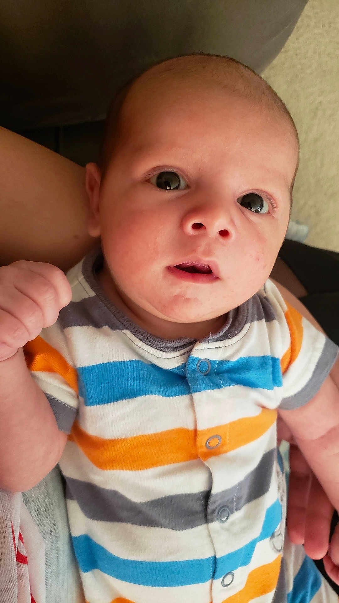 Quentin Maximus joined the competition — help win amazing prizes! baby, infant, child, person, face, eyes, clothing, onesie, striped, hand, skin, cute, portrait, expression, newborn, holding, indoor, closeup, human, young
