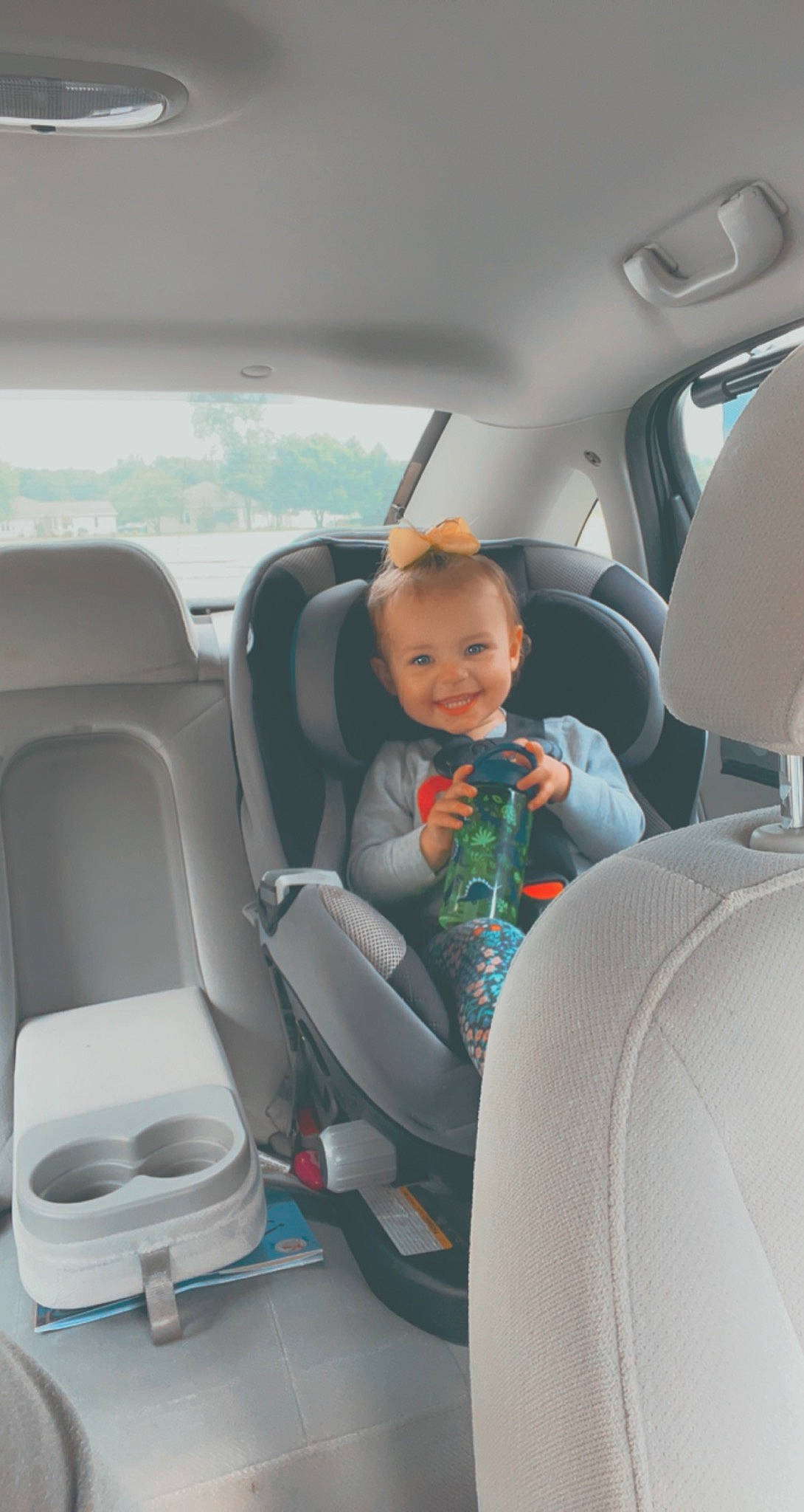 Braylyn is registered to the contest to win money with this photo: auto_part, automotive_design, automotive_exterior, car, car_seat, car_seat_cover, comfort, family_car, head_restraint, joy, luxury_vehicle, mid_size_car, mode_of_transport, motor_vehicle, person, personal_luxury_car, seat_belt, smile, toddler, vehicle