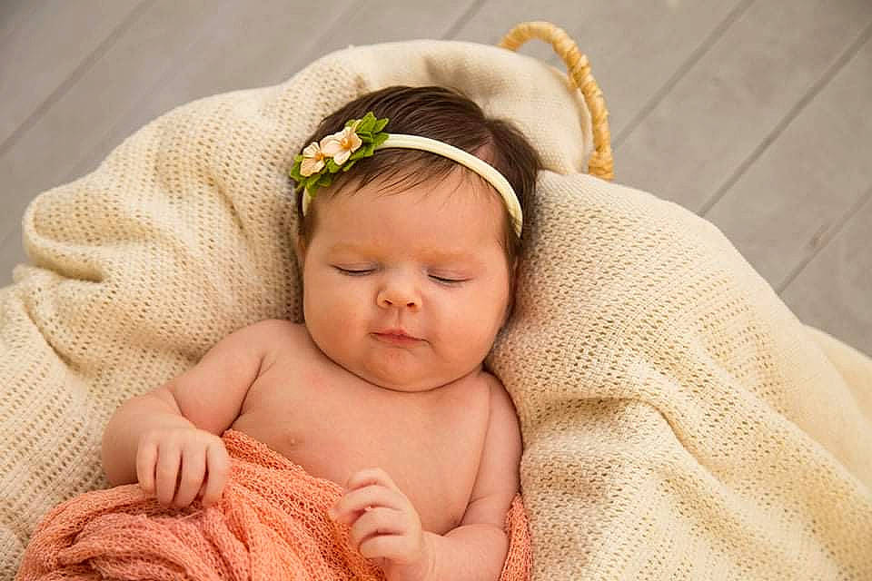 Blakelynn is registered to the contest to win money with this photo: baby, baby_sleeping, baby_toddler_clothing, cheek, chin, comfort, ear, face, finger, grass, hand, happy, head, headband, headgear, headpiece, iris, mammal, person, skin