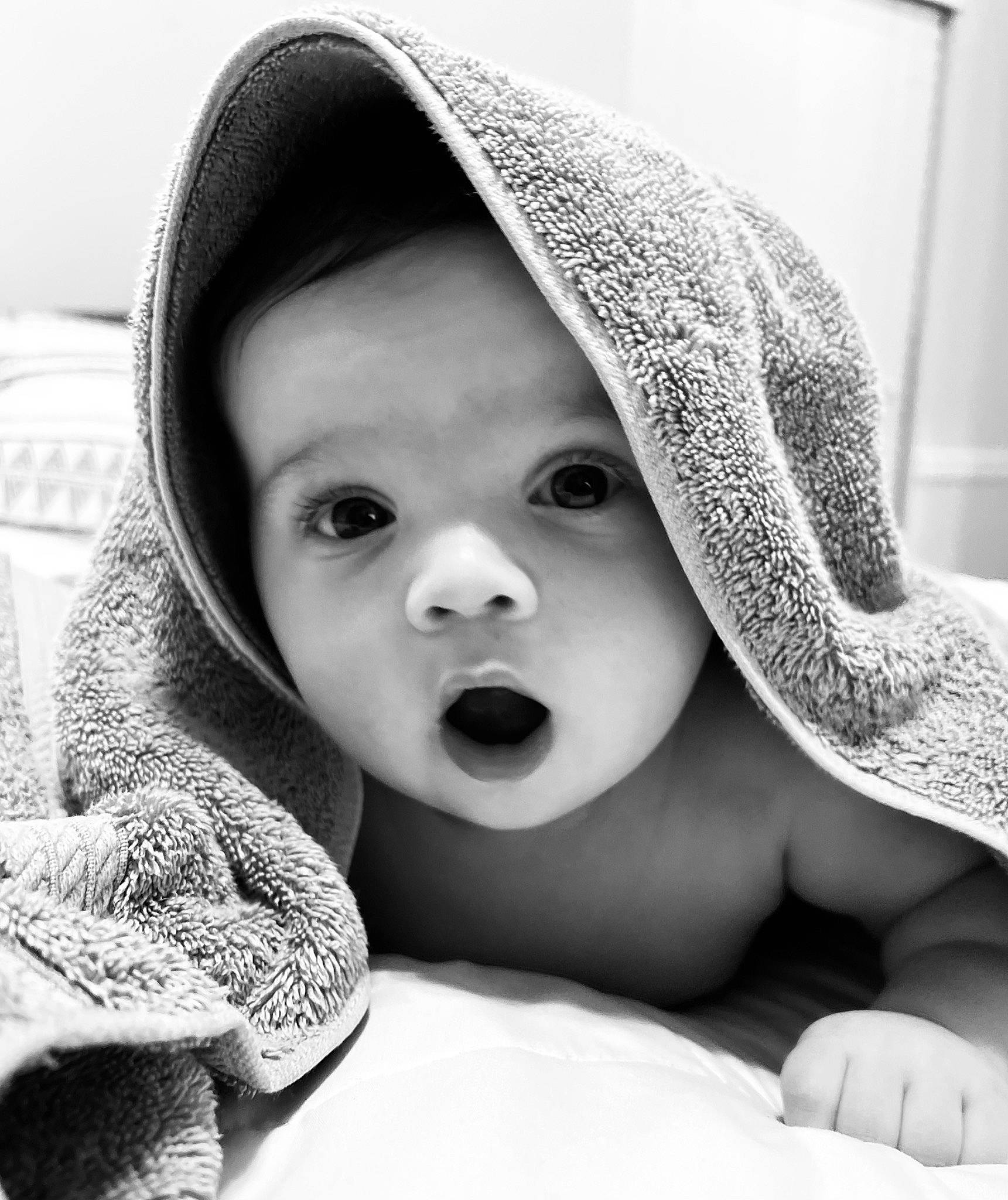 Liam joined the competition — help win amazing prizes! baby, black_and_white, cap, cheek, chin, comfort, eye, eyebrow, face, flash_photography, gesture, happy, headgear, iris, lip, mouth, nose, person, skin, smile