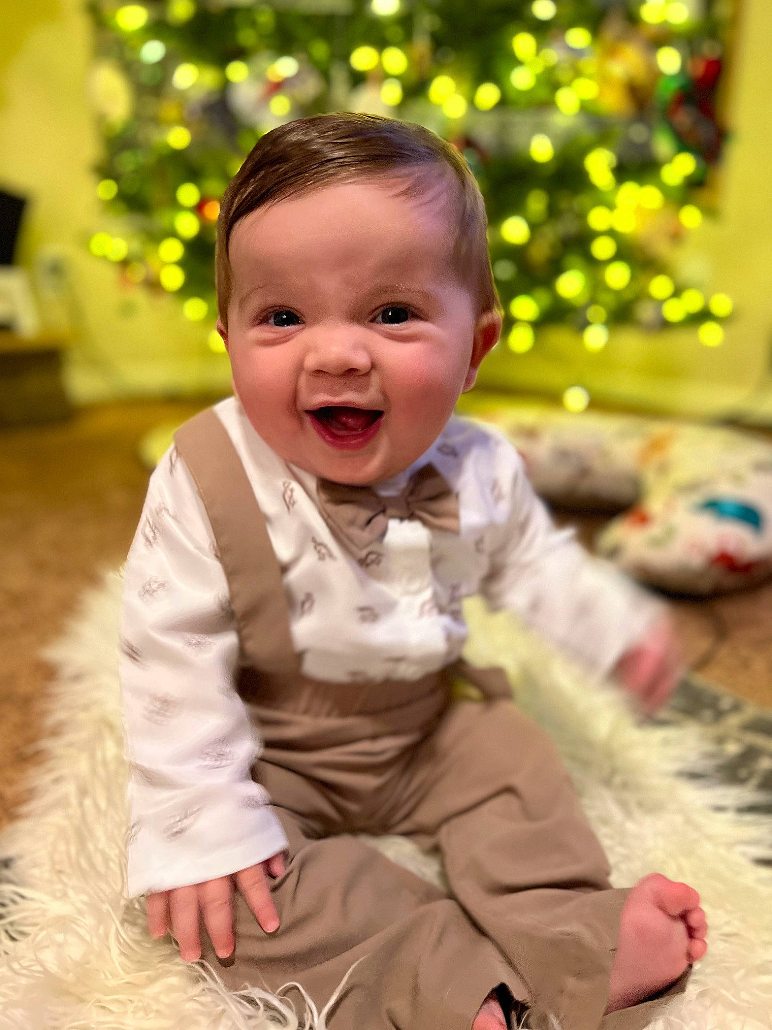Liam is registered to the contest to win money with this photo: baby, baby_toddler_clothing, cheek, dress, facial_expression, flooring, fun, grass, hair, happy, head, houseplant, people_in_nature, person, plant, skin, sleeve, smile, standing, toddler