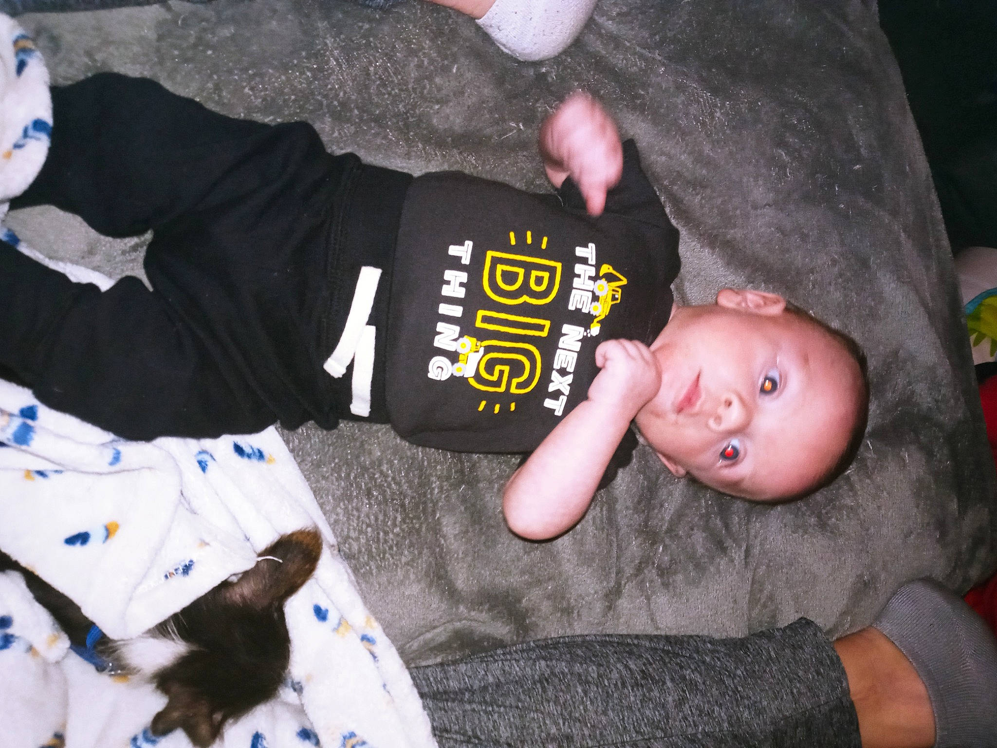 Ryder is registered to the contest to win money with this photo: baby, baby_toddler_clothing, child, comfort, flash_photography, fun, gesture, hand, headgear, human_body, joint, leg, nail, person, sleeve, t_shirt, thumb, toddler, toy, tree