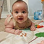 baby, infant, smiling, happy, play_mat, indoor, child, cute, chubby, face, person, carpet, clothing, hand, head, eyes, mouth, skin, toy, home