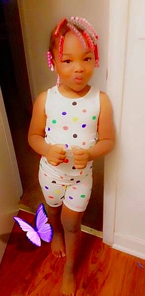 Summer is registered to the contest to win money with this photo: arm, baby_toddler_clothing, eye, eyebrow, face, glasses, hair, head, leg, lip, neck, orange, person, pink, purple, skin, sleeve, standing, sunglasses, thigh