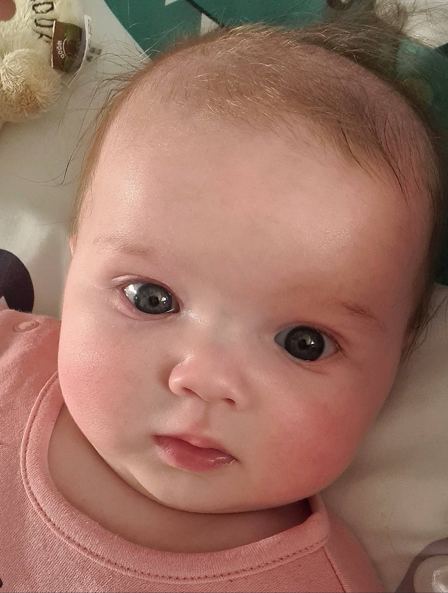 Joelie is registered to the contest to win money with this photo: baby, baby_toddler_clothing, cheek, chest, child, chin, ear, eyebrow, eyelash, forehead, hair, hairstyle, iris, lip, mouth, neck, no_expression, nose, person, skin