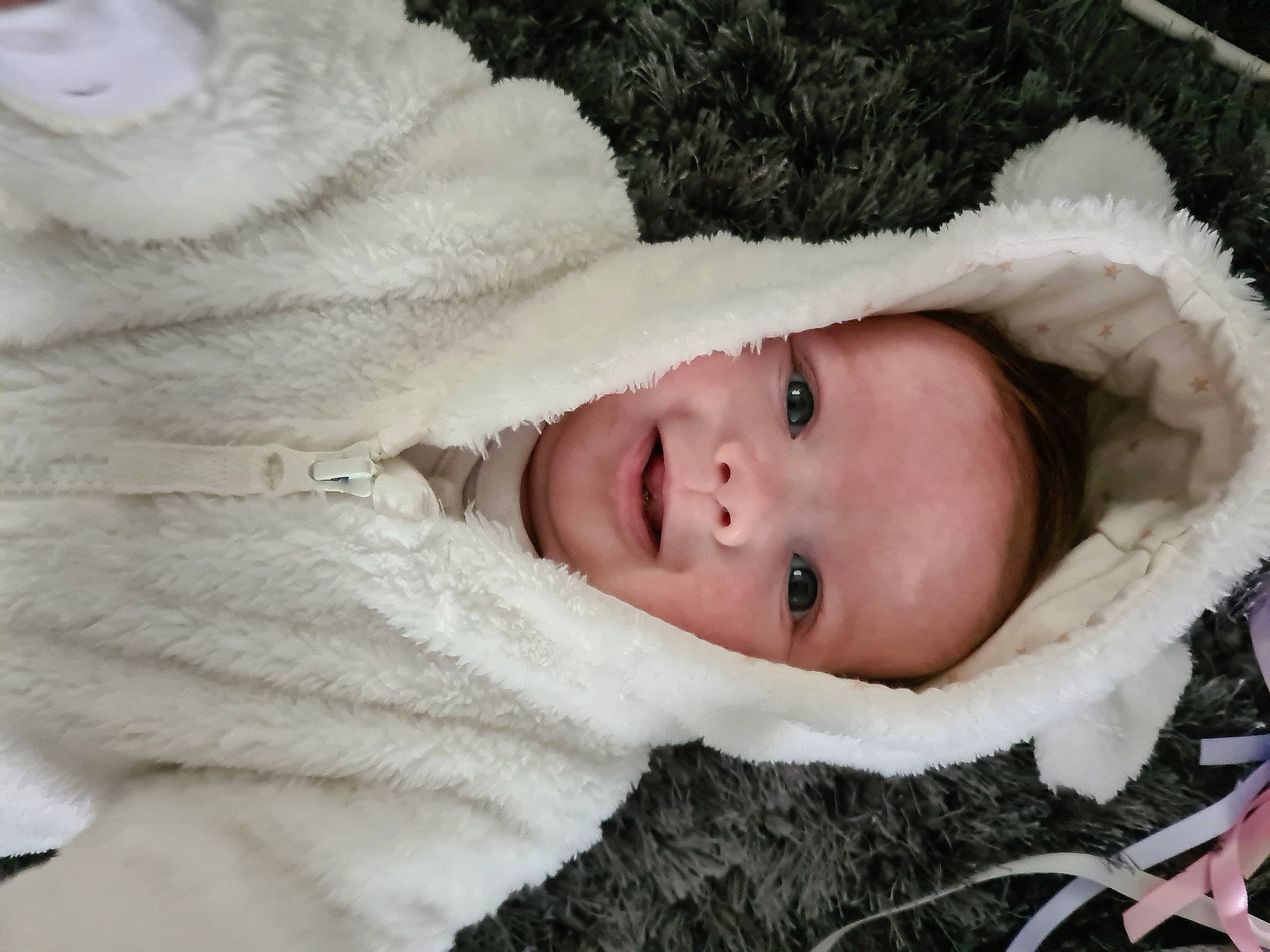 Joelie is registered to the contest to win money with this photo: beauty, cheek, child, comfort, eye, eyebrow, eyelash, freezing, fur, fur_clothing, headgear, iris, nose, person, skin, textile, toddler, tree, winter, wood