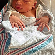 Max is registered to the contest to win money with this photo: architecture, baby, bed, bedroom, blanket, bodypart, building, face, finger, furniture, hand, head, hospital, newborn, person, photography, portrait, quilt, sleeping, towel