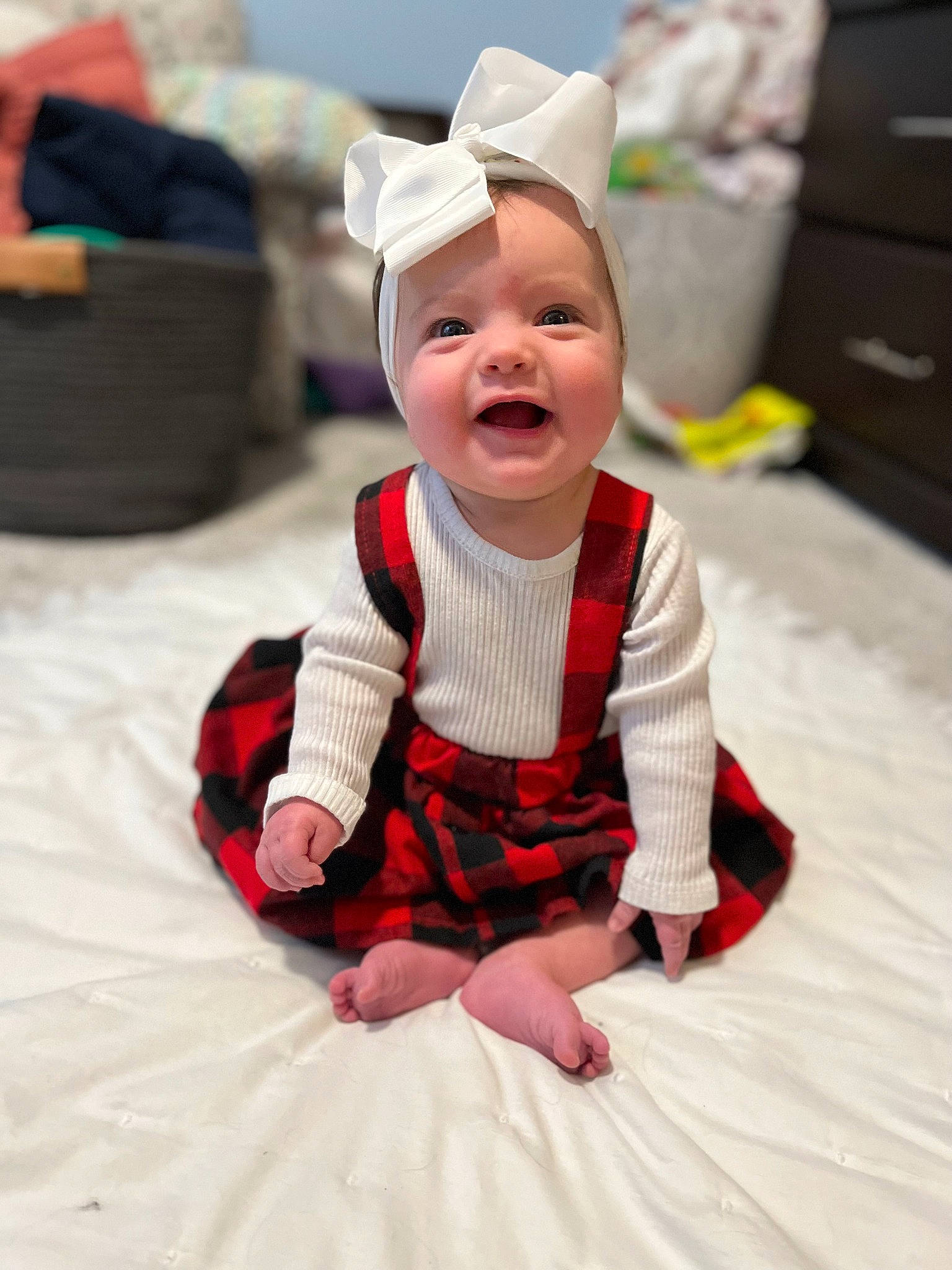 Ellie joined the competition — help win amazing prizes! baby, baby_toddler_clothing, bag, cabinetry, chest_of_drawers, child, comfort, costume_hat, drawer, event, facial_expression, fun, happy, hat, luggage_and_bags, pattern, person, sitting, sleeve, smile
