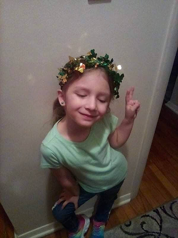 Nova is registered to the contest to win money with this photo: baby_toddler_clothing, cheek, child, dress, eye, eyebrow, fashion_accessory, fun, gesture, hair_accessory, hairstyle, happy, headband, headpiece, jewellery, joy, person, sleeve, smile, sock