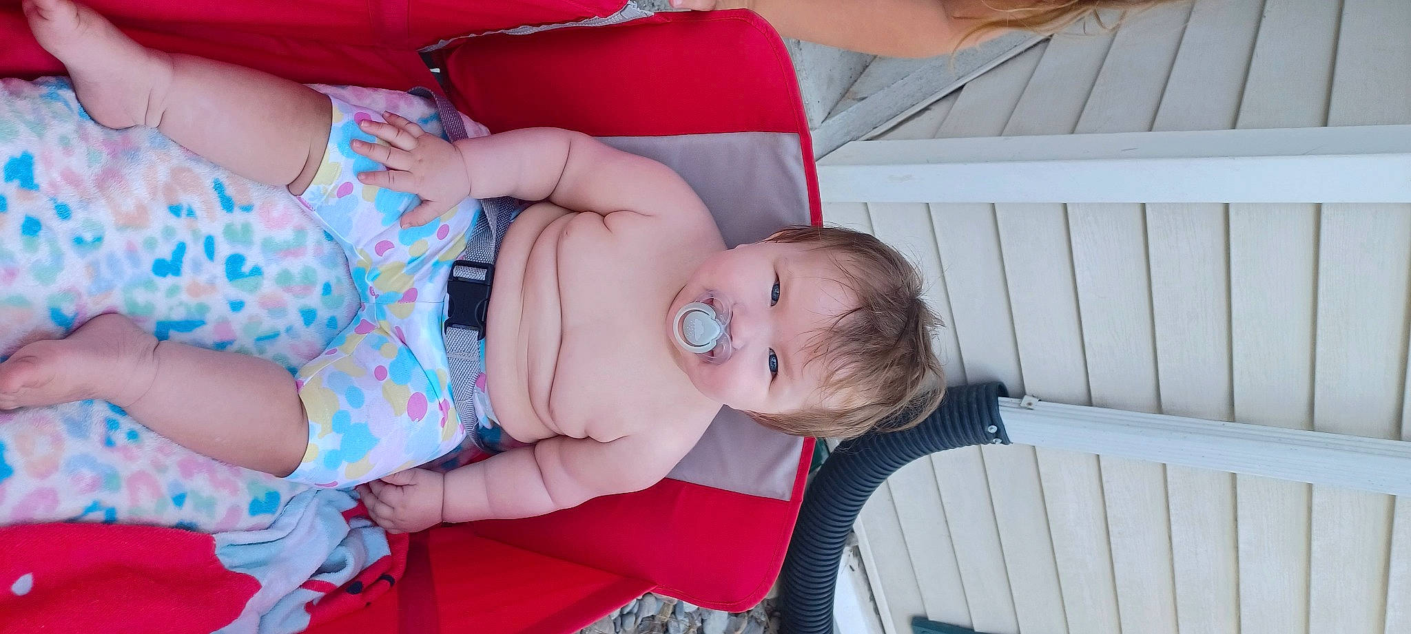 Bobbie joined the competition — help win amazing prizes! baby, baby_products, baby_toddler_clothing, beauty, child, comfort, fun, happy, hat, human_body, human_leg, nail, pattern, person, product, red, sitting, skin, thigh, toddler