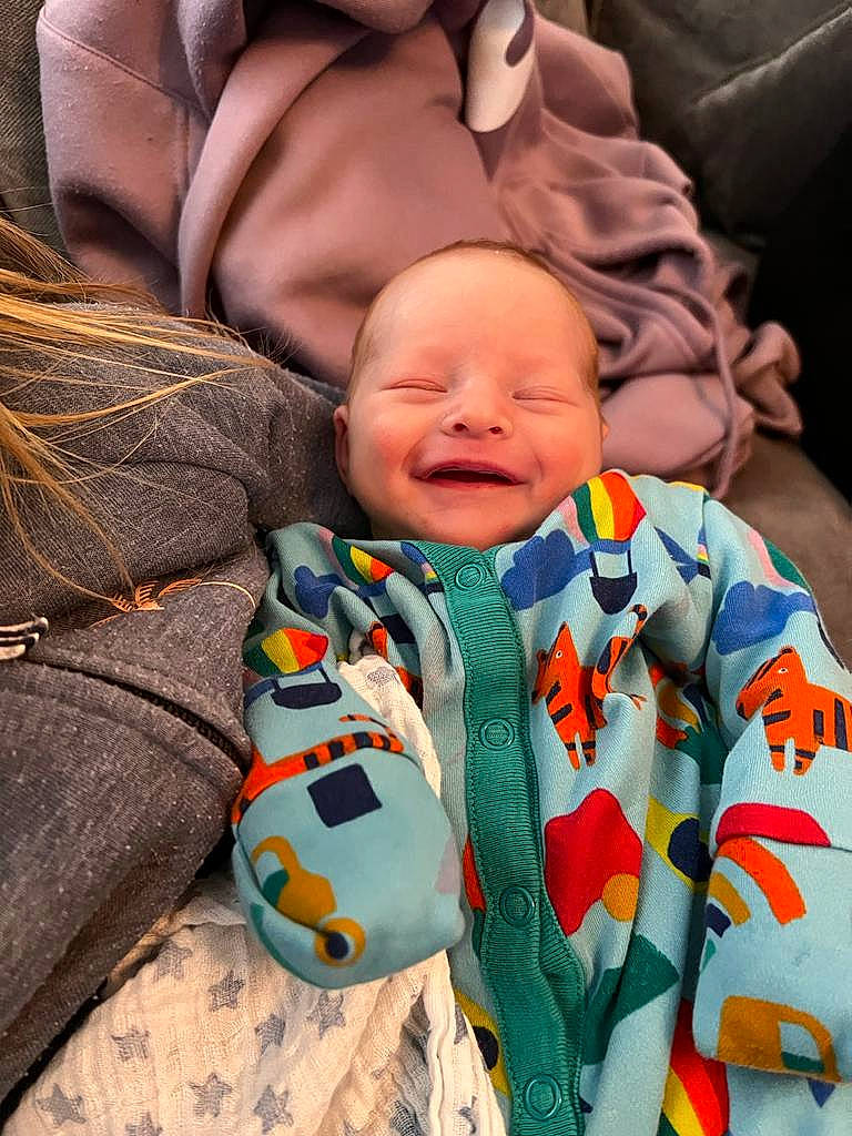 Henry joined the competition — help win amazing prizes! baby, baby_products, baby_toddler_clothing, cheek, child, comfort, event, fun, happy, head, linens, outerwear, people, person, product, sitting, skin, sleeve, smile, textile