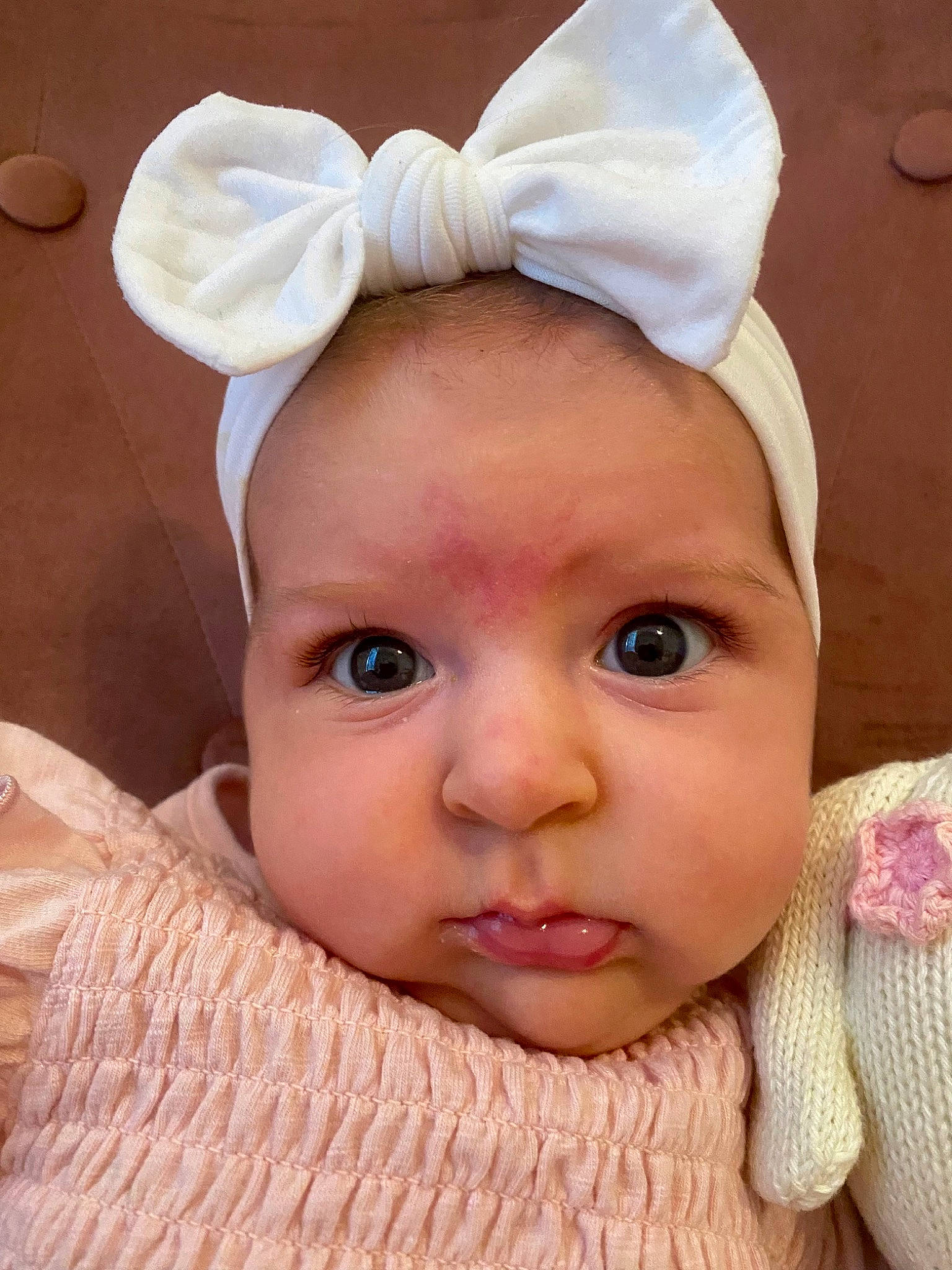 Cora joined the competition — help win amazing prizes! baby, baby_toddler_clothing, cheek, eye, eyebrow, eyelash, face, fashion_accessory, hair_accessory, happy, head, headpiece, lip, no_expression, nose, peach, person, pink, skin, toddler