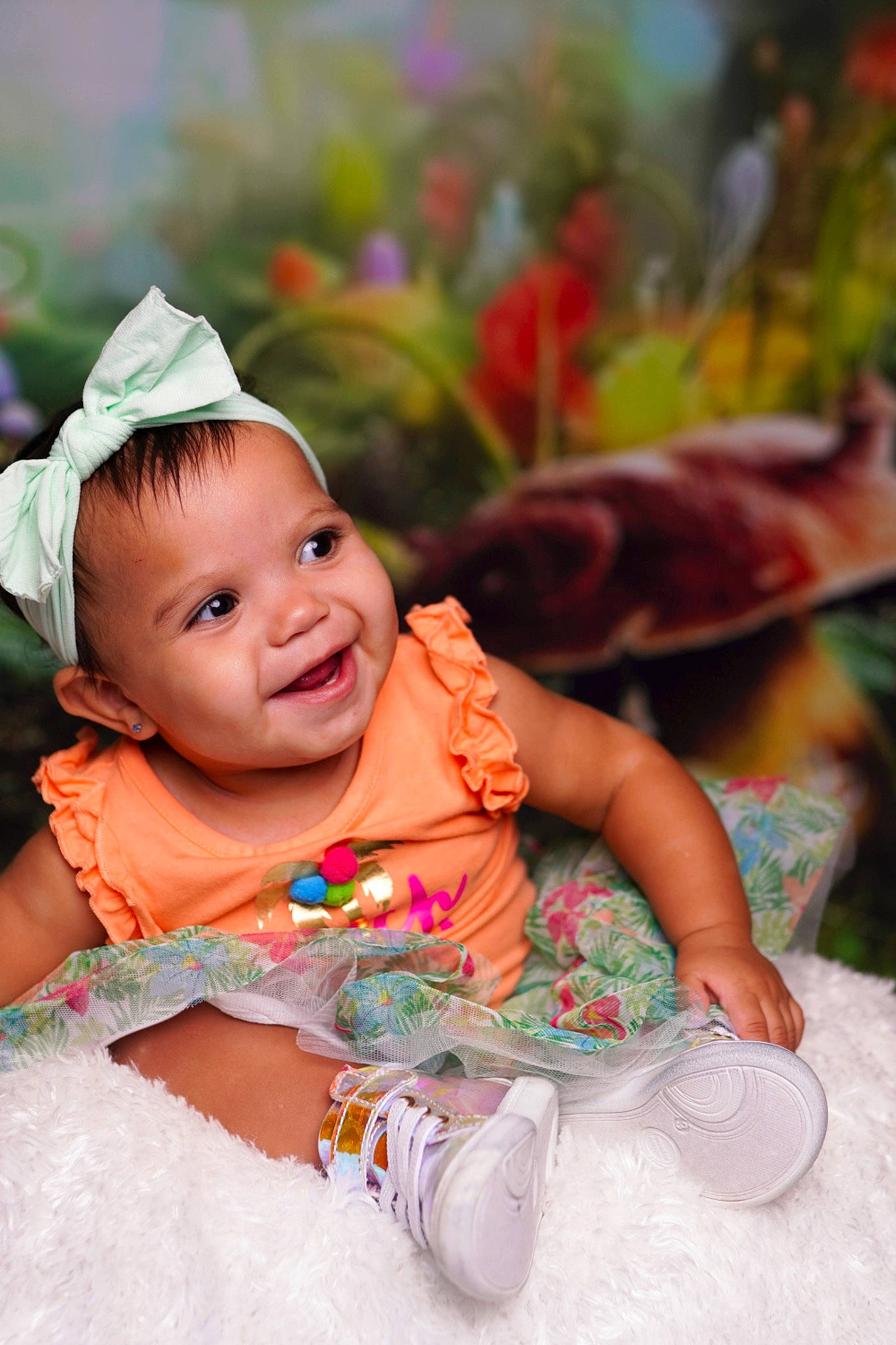 Dmia is registered to the contest to win money with this photo: baby, baby_toddler_clothing, birthday, cap, child, event, fun, grass, hair_accessory, happy, headpiece, joy, leisure, person, pink, recreation, sitting, skin, smile, sweetness