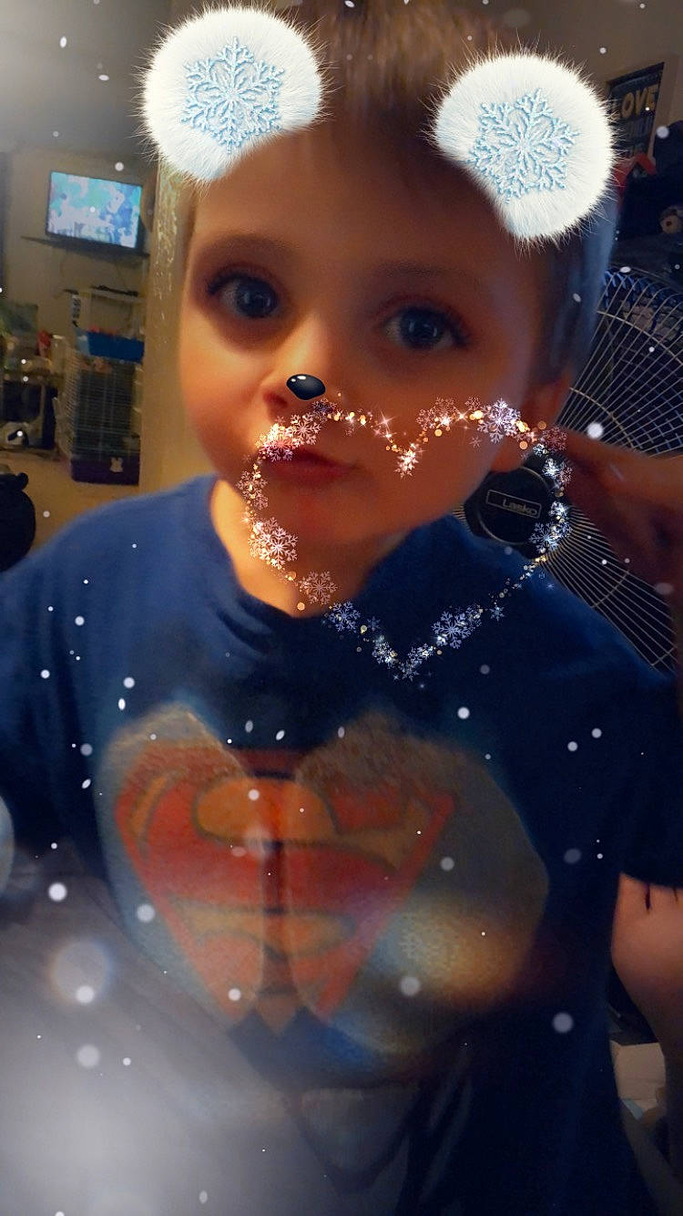 Haiden is registered to the contest to win money with this photo: cheek, child, christmas, doll, eye, face, head, lip, nose, person, smile, toddler, toy