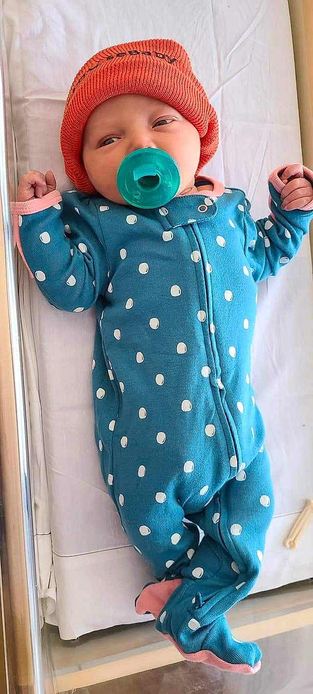 Phoenix is registered to the contest to win money with this photo: aqua, baby, baby_products, baby_sleeping, baby_toddler_clothing, blazer, blue, collar, electric_blue, happy, hat, headwear, jacket, outerwear, pattern, person, shirt, sleeve, suit, textile