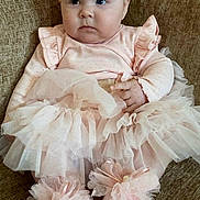 Ariana Maeve joined the competition — help win amazing prizes! baby, infant, pink_bow, headband, tutu, dress, sitting, couch, child, cute, soft_toys, footwear, ruffles, portrait, indoor, young_child, adorable, fashion, pretty, small