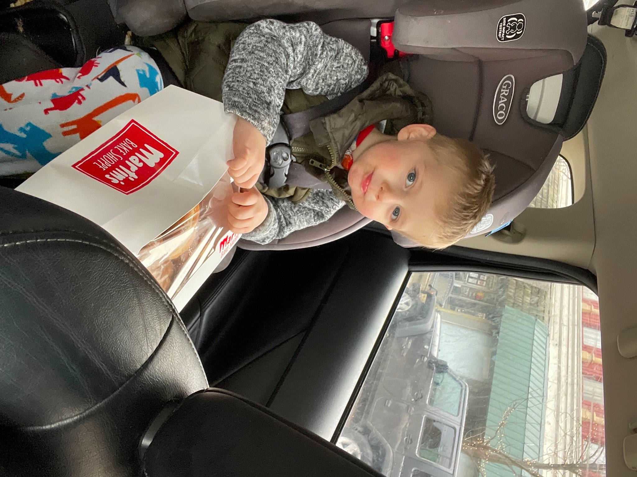 Jaxon is registered to the contest to win money with this photo: auto_part, automotive_design, automotive_exterior, automotive_wheel_system, automotive_window_part, car, car_seat, car_seat_cover, comfort, family_car, helmet, luxury_vehicle, motor_vehicle, person, personal_luxury_car, steering_part, steering_wheel, toddler, vehicle, vehicle_door