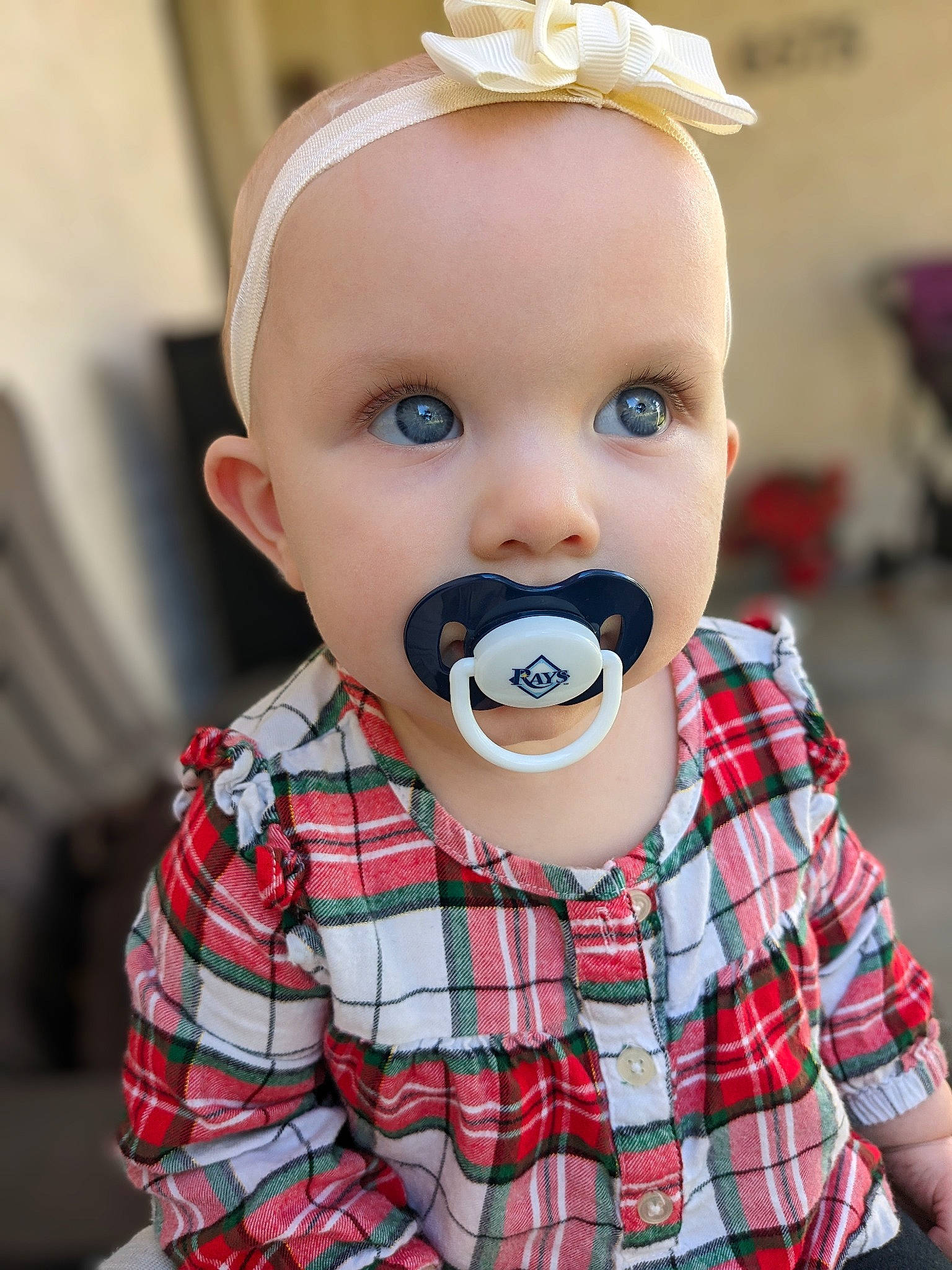 Brooklynn joined the competition — help win amazing prizes! audio_equipment, baby, baby_toddler_clothing, cheek, child, collar, ear, eyelash, fun, happy, head, headpiece, lip, nose, pattern, person, plaid, sleeve, tartan, toddler