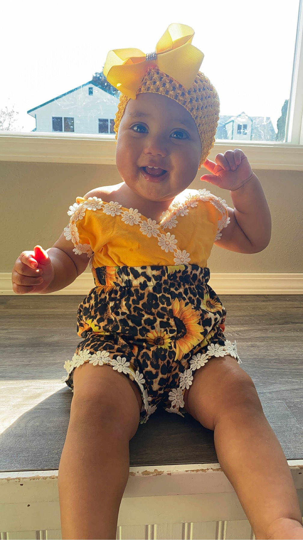 Estella joined the competition — help win amazing prizes! baby_toddler_clothing, child, facial_expression, finger, foot, fun, hand, happy, headwear, human_leg, joy, leg, leisure, one_piece_swimsuit, person, sky, smile, standing, thigh, thumb