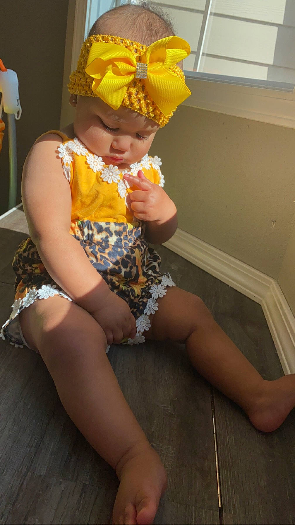 Estella joined the competition — help win amazing prizes! baby, chair, child, costume, costume_hat, fashion_accessory, fashion_design, foot, fun, happy, hat, headwear, human_leg, knee, lap, person, room, sitting, thigh, toddler