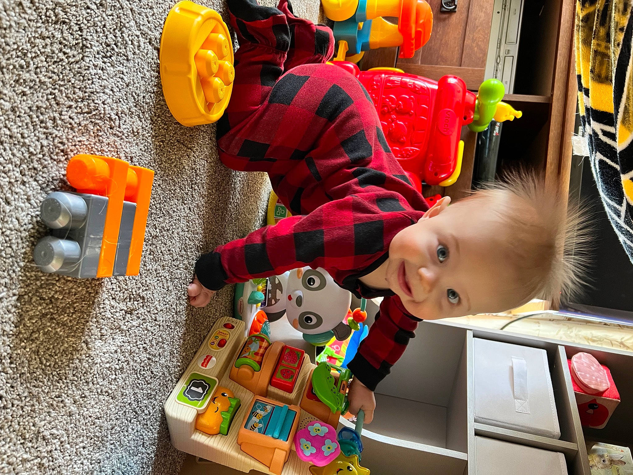 Dexter joined the competition — help win amazing prizes! baby_toys, child, fun, lego, motor_vehicle, orange, person, personal_protective_equipment, photograph, plastic, play, product, red, room, snapshot, stuffed_toy, toddler, toy, toy_vehicle, wood