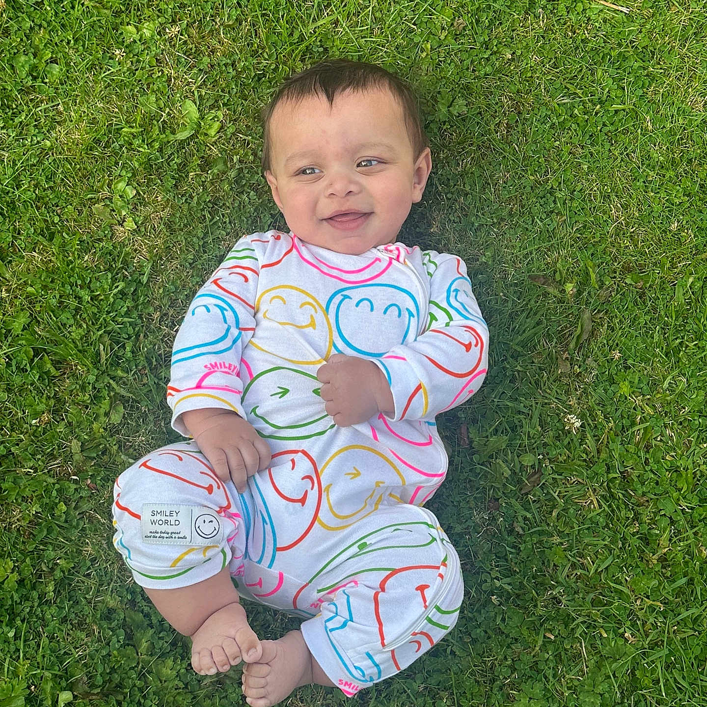 Stalin is registered to the contest to win money with this photo: baby, barefoot, casual, child, colorful_clothing, cute, face, grass, greenery, happy, infant, joyful, nature, onesie, outdoor, person, playful, relaxed, smile, young