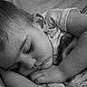arm, baby, bedding, black_and_white, blanket, child, closeup, eyelashes, head, monochrome, nap, peaceful, pillow, portrait, shirt, skin, sleeping, soft_texture, stuffed_animal, toddler
