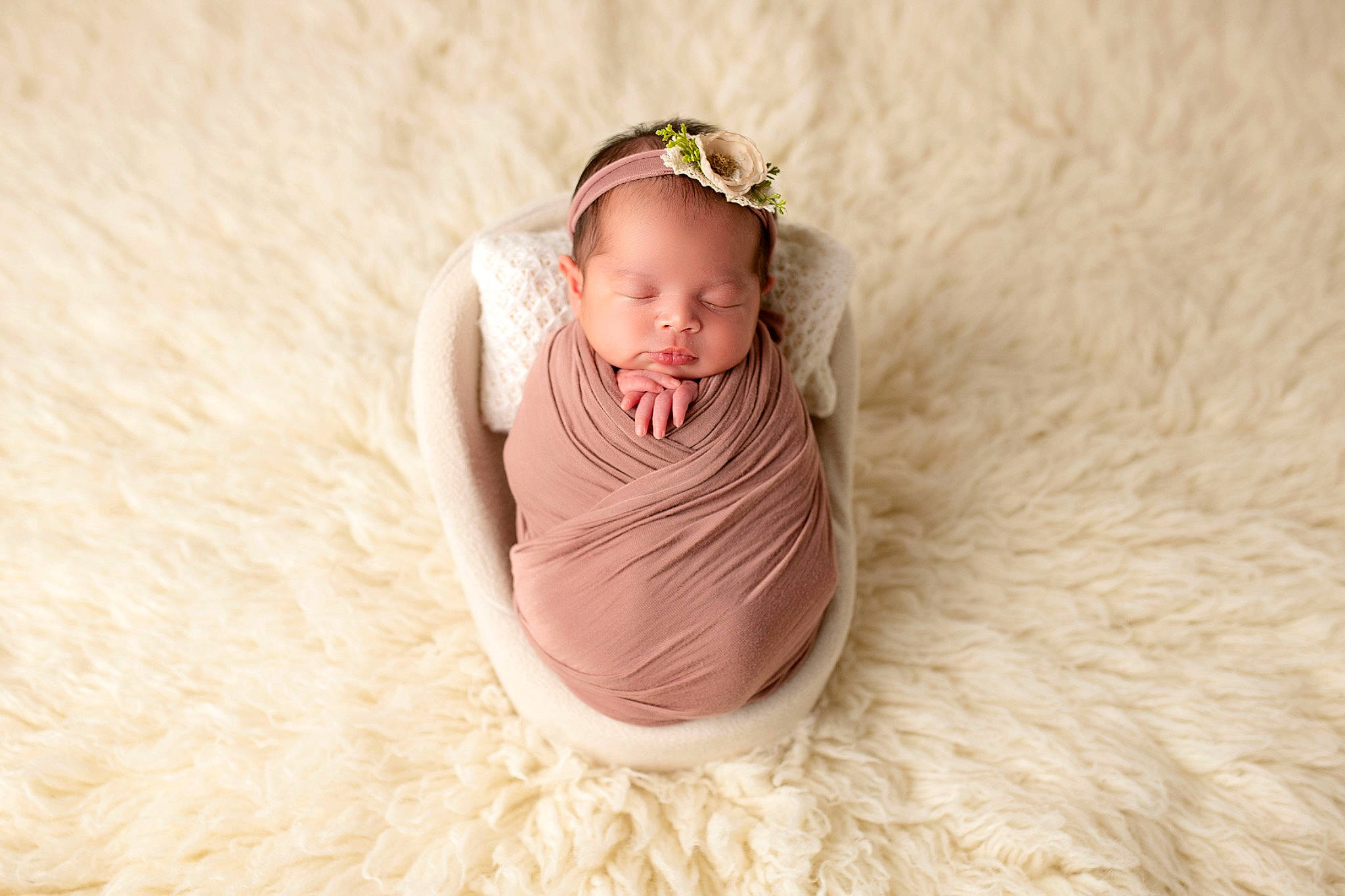 Belen Ahava is registered to the contest to win money with this photo: baby, baby_toddler_clothing, bedding, child, comfort, dress, eye, fashion_accessory, flooring, fur, happy, headband, headgear, headpiece, linens, magenta, peach, person, sitting, toddler