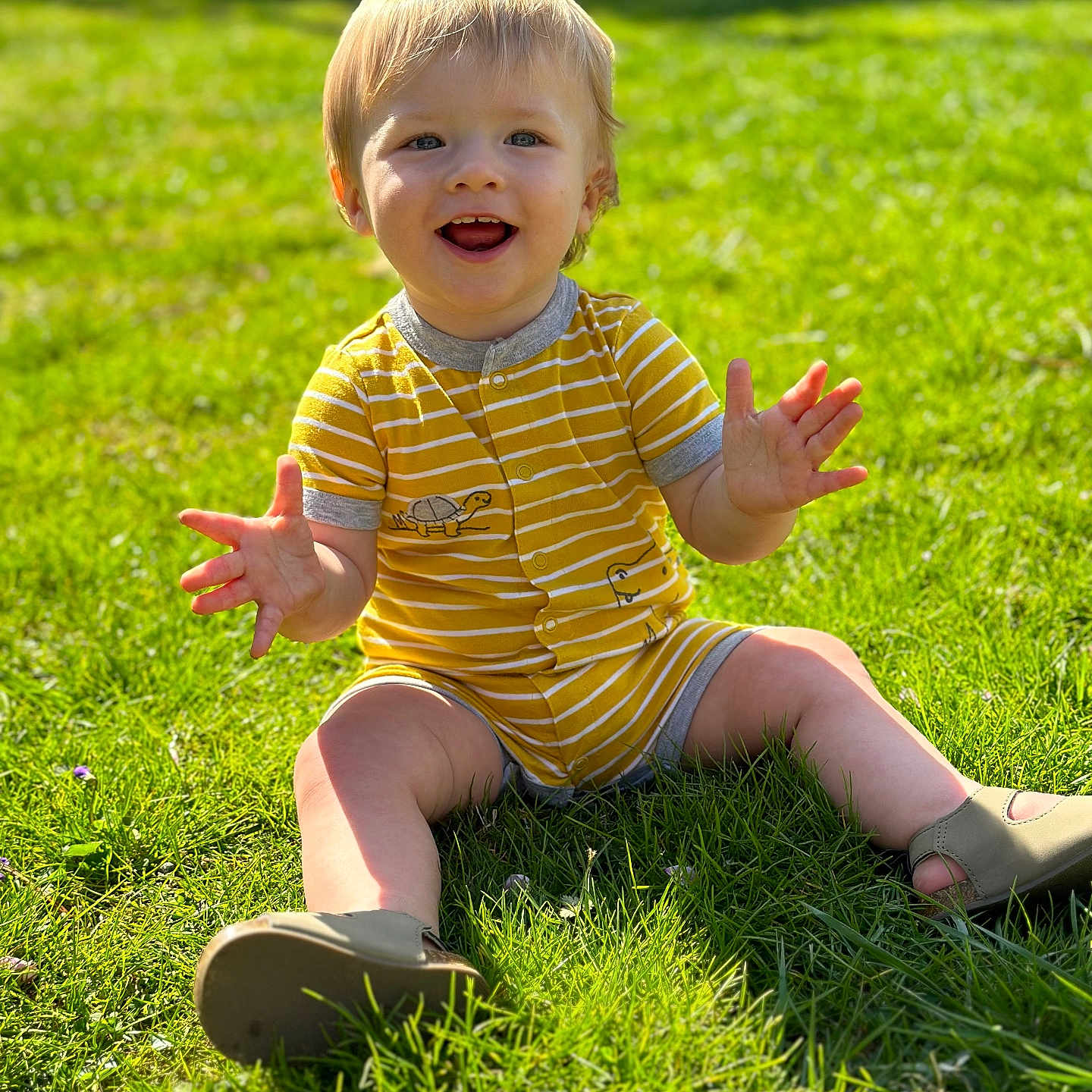 Oakley joined the competition — help win amazing prizes! baby, bodypart, car, clothing, face, finger, grass, hand, head, lawn, nature, outdoors, park, person, photography, plant, portrait, sitting, transportation, vehicle