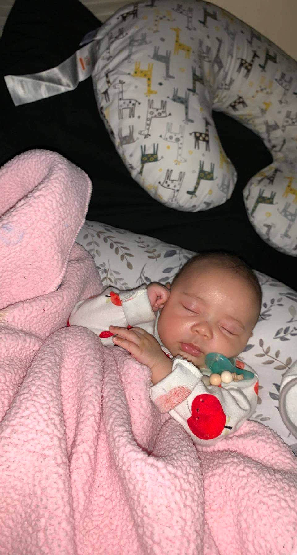 Reign joined the competition — help win amazing prizes! baby, baby_sleeping, baby_toddler_clothing, beauty, bed, bedding, bedtime, carmine, cheek, child, comfort, finger, head, human, linens, pattern, person, room, skin, toddler