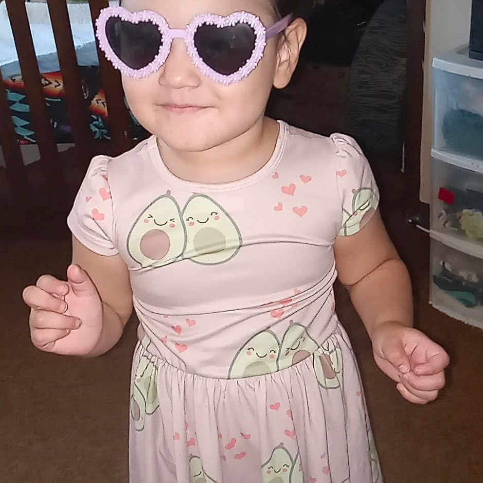 Joanna joined the competition — help win amazing prizes! accessories, baby, bodypart, clothing, costume, crib, dress, face, finger, furniture, glasses, hand, head, indoors, infantbed, person, photography, portrait, sunglasses, t_shirt