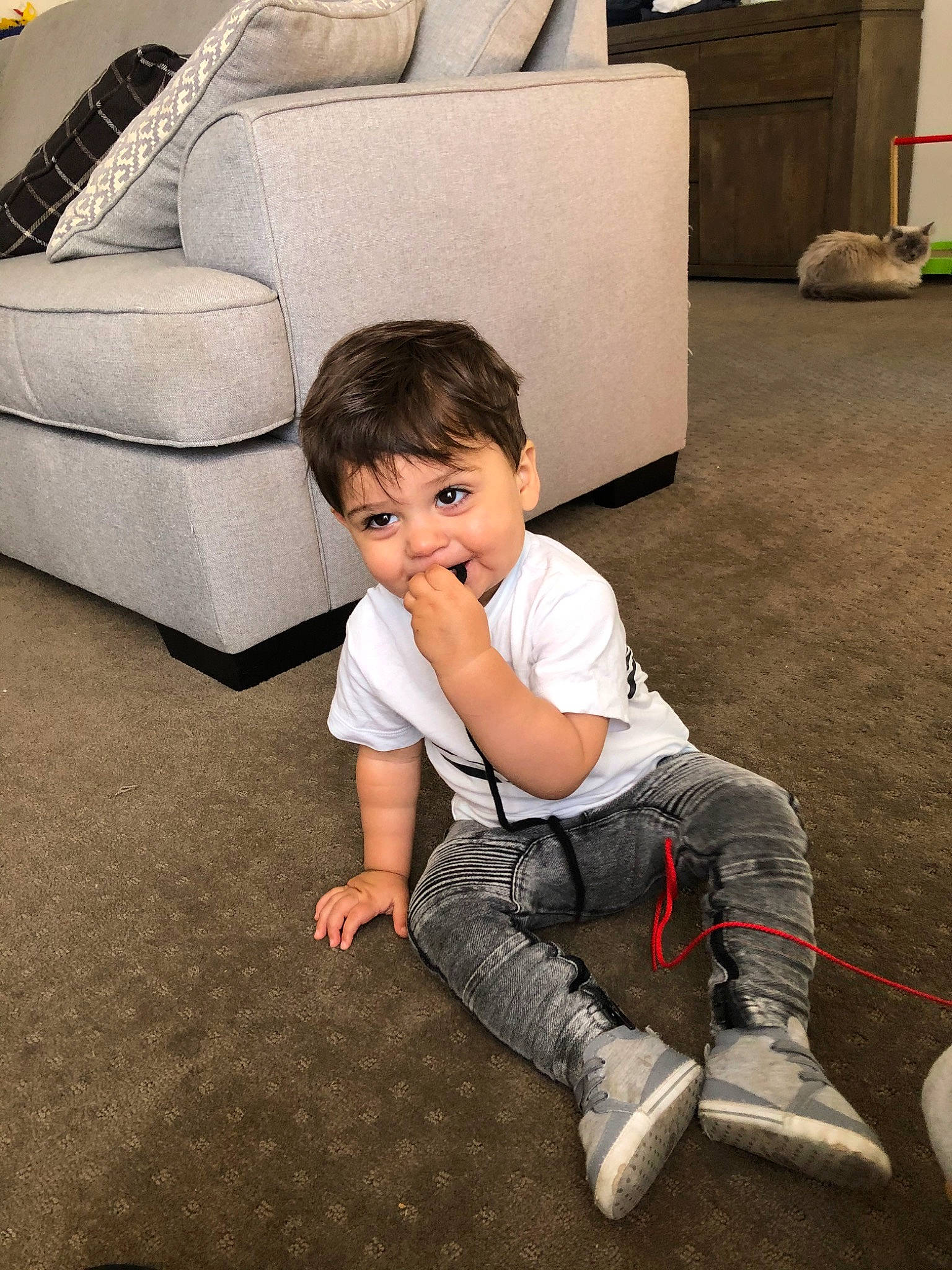 Krish is registered to the contest to win money with this photo: child, floor, flooring, footwear, fun, joy, leg, person, play, shoe, sitting, toddler