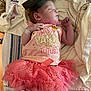 newborn, baby, sleeping, tutu, pink, graduation_cap, hospital, blanket, clothing, cute, infant, person, sleep, toddler, wearing, footwear, sock, bed, indoors, rest