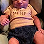 Shopia Vantrease is registered to the contest to win money with this photo: baby, infant, child, headband, bow, shirt, clothing, sitting, seat, cushion, cute, portrait, indoors, skin, legs, hand, face, eyes, expression, young