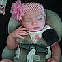 Shopia Vantrease is registered to the contest to win money with this photo: baby, infant, car_seat, headband, flower, pacifier, safety_straps, sleeping, child, cute, pink, clothing, hand, face, portrait, seat, child_seat, resting, toddler, young_child