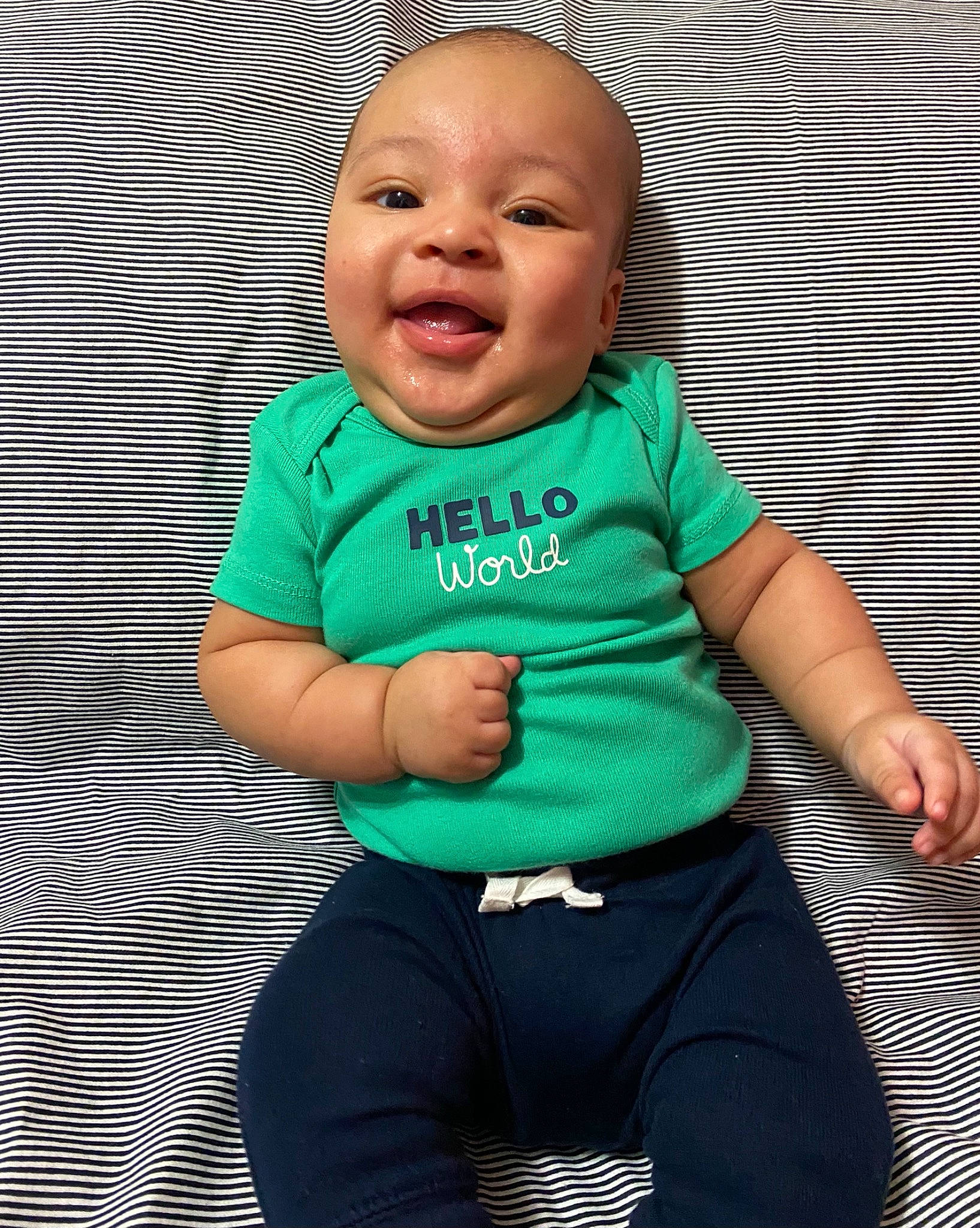 Cairo joined the competition — help win amazing prizes! active_pants, baby, baby_toddler_clothing, cheek, chin, eye, face, facial_expression, gesture, happy, head, human_body, person, pink, product, skin, sleeve, smile, standing, t_shirt