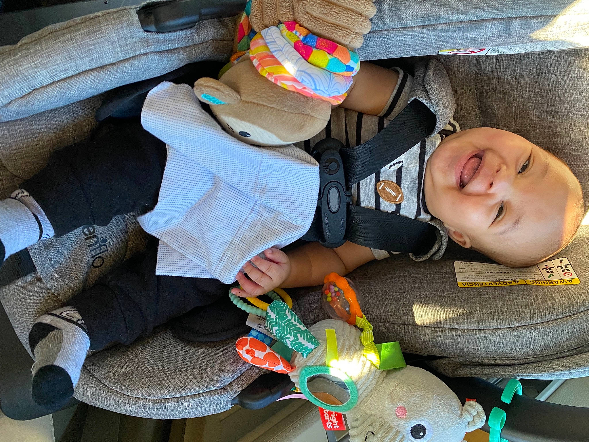 Cairo is registered to the contest to win money with this photo: baby, baby_carriage, baby_products, baby_toddler_clothing, cap, car_seat, child, comfort, fashion_accessory, finger, fun, happy, hat, headgear, joy, nail, person, product, smile, textile