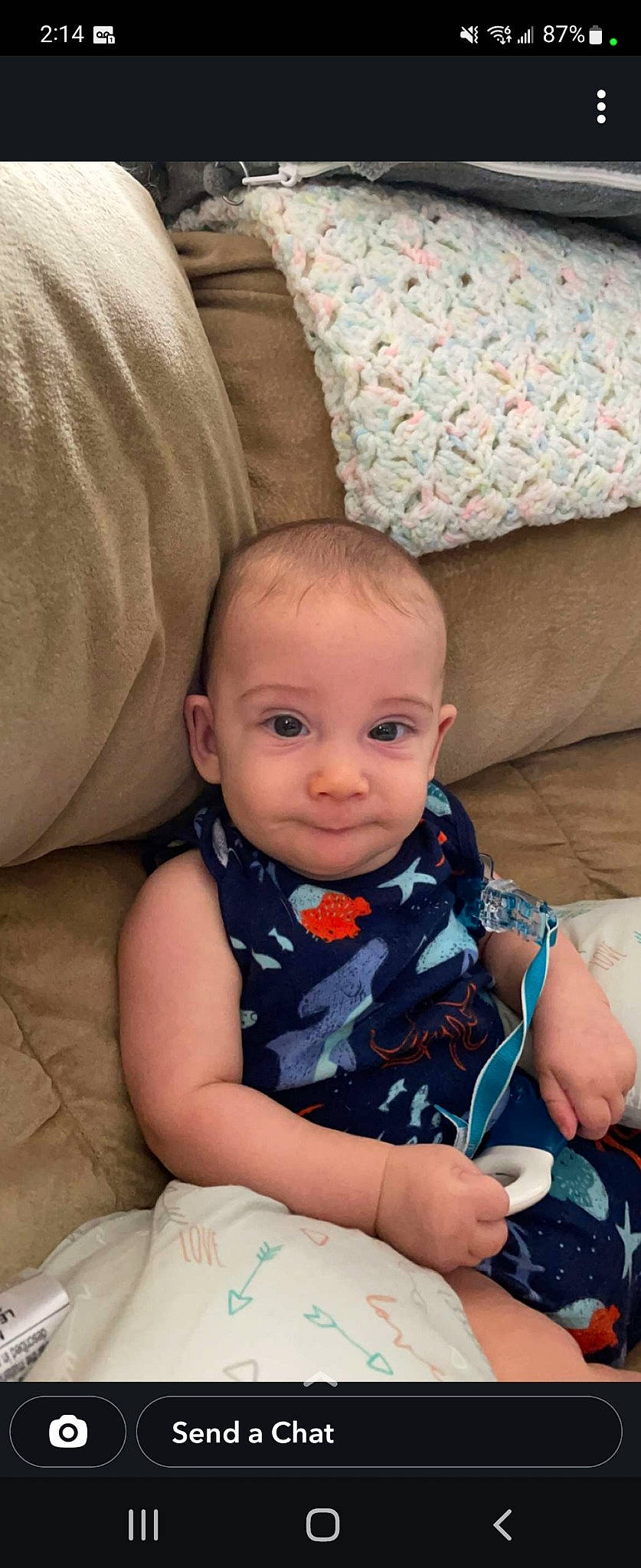 Johnathan joined the competition — help win amazing prizes! baby, baby_toddler_clothing, cheek, child, chin, comfort, couch, eye, finger, flooring, happy, head, iris, lap, linens, person, sitting, skin, smile, toddler