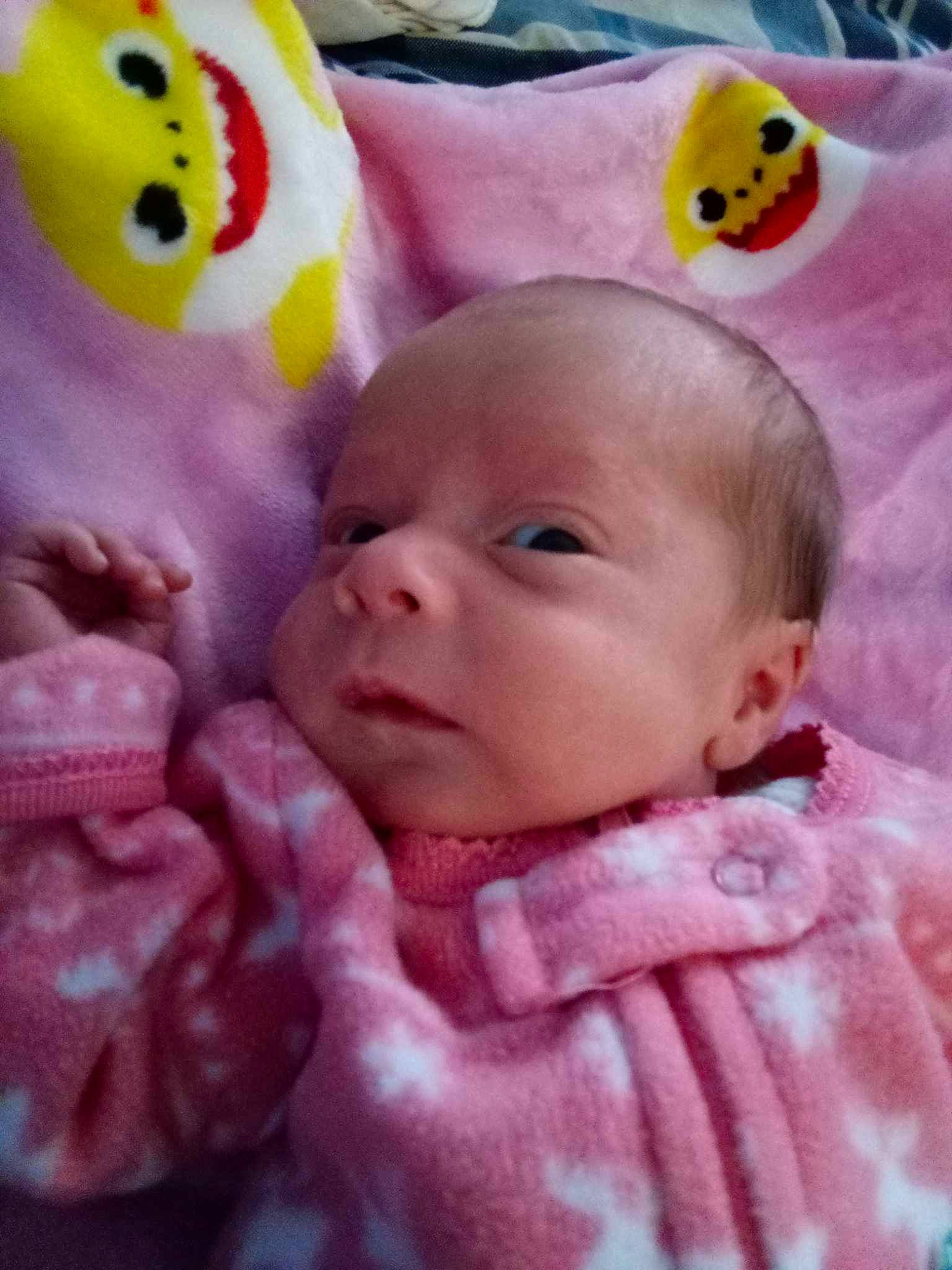 Summer is registered to the contest to win money with this photo: baby, baby_products, baby_sleeping, baby_toddler_clothing, bedtime, cheek, child, comfort, face, fun, happy, head, linens, mouth, nose, person, pink, skin, textile, toddler