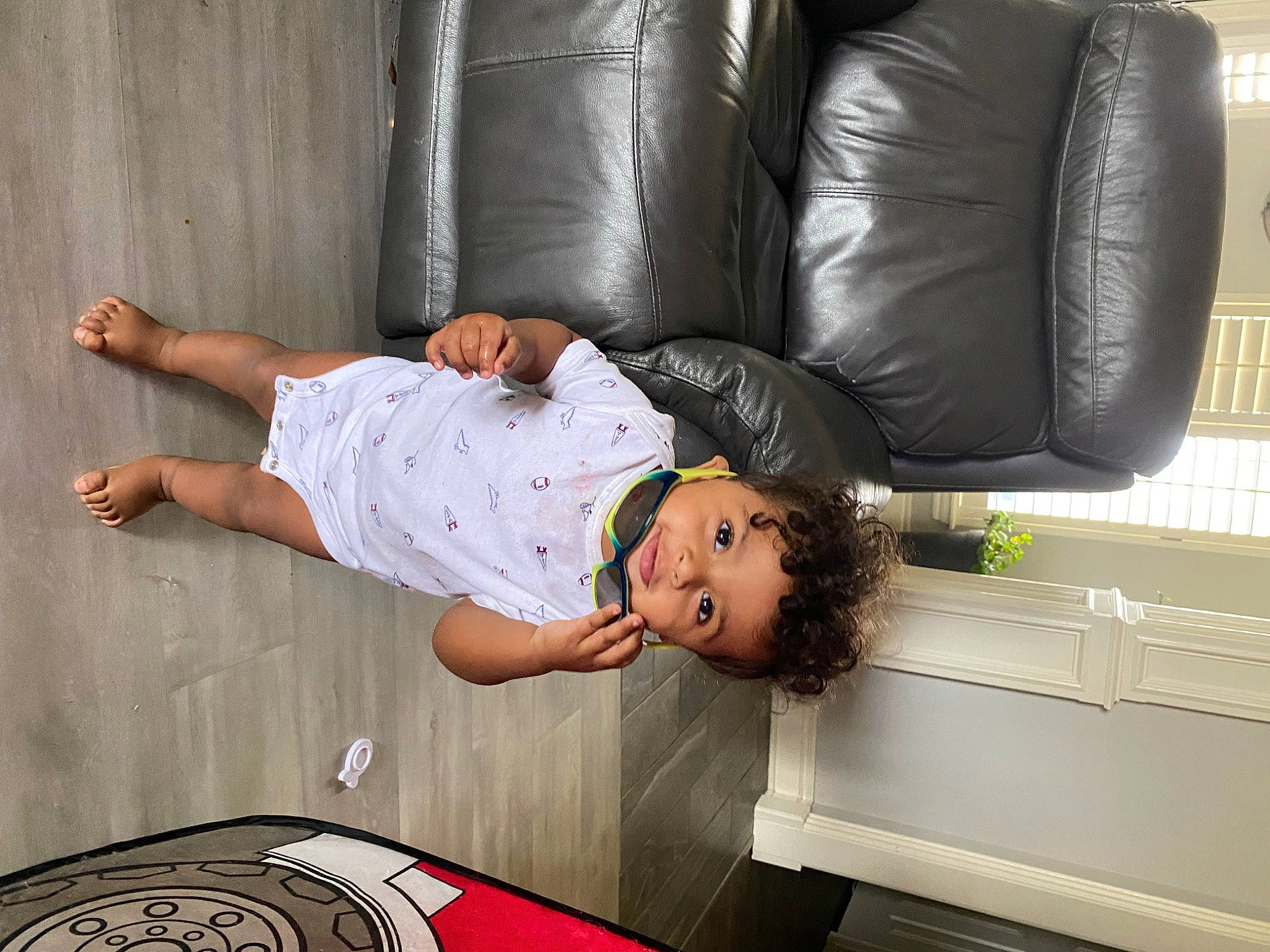 Huxley is registered to the contest to win money with this photo: beauty, comfort, couch, floor, flooring, foot, hair, human_body, human_leg, joint, knee, leg, person, room, sitting, snapshot, sofa_bed, studio_couch, t_shirt, thigh