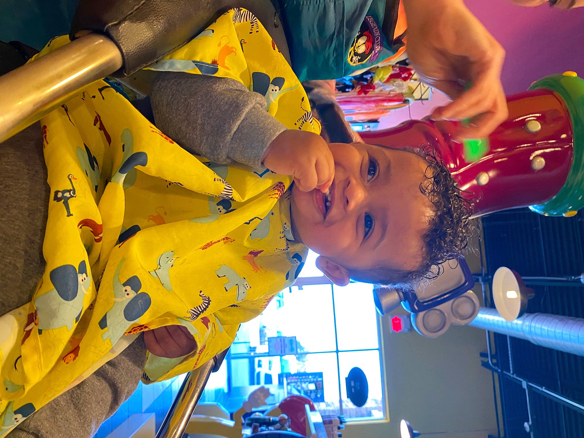 Huxley is registered to the contest to win money with this photo: blue, child, electric_blue, entertainment, event, fun, games, happy, leisure, person, personal_protective_equipment, play, public_event, recreation, t_shirt, thigh, tree, water, world, yellow