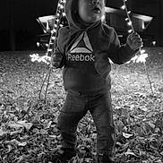 Zaydin is registered to the contest to win money with this photo: bodypart, boy, child, clothing, face, finger, hand, head, jeans, knitwear, male, nature, night, outdoors, pants, person, photography, playarea, portrait, soil
