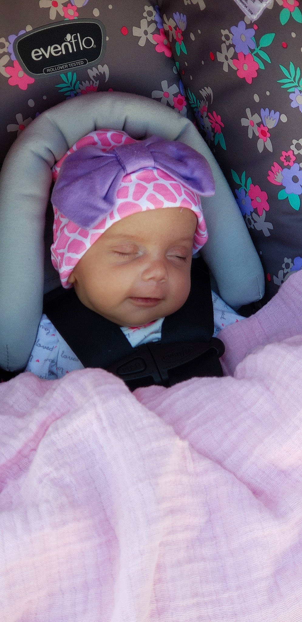 Carley is registered to the contest to win money with this photo: baby, baby_products, cheek, child, head, headgear, person, pink, purple, skin, sleep, smile, toddler