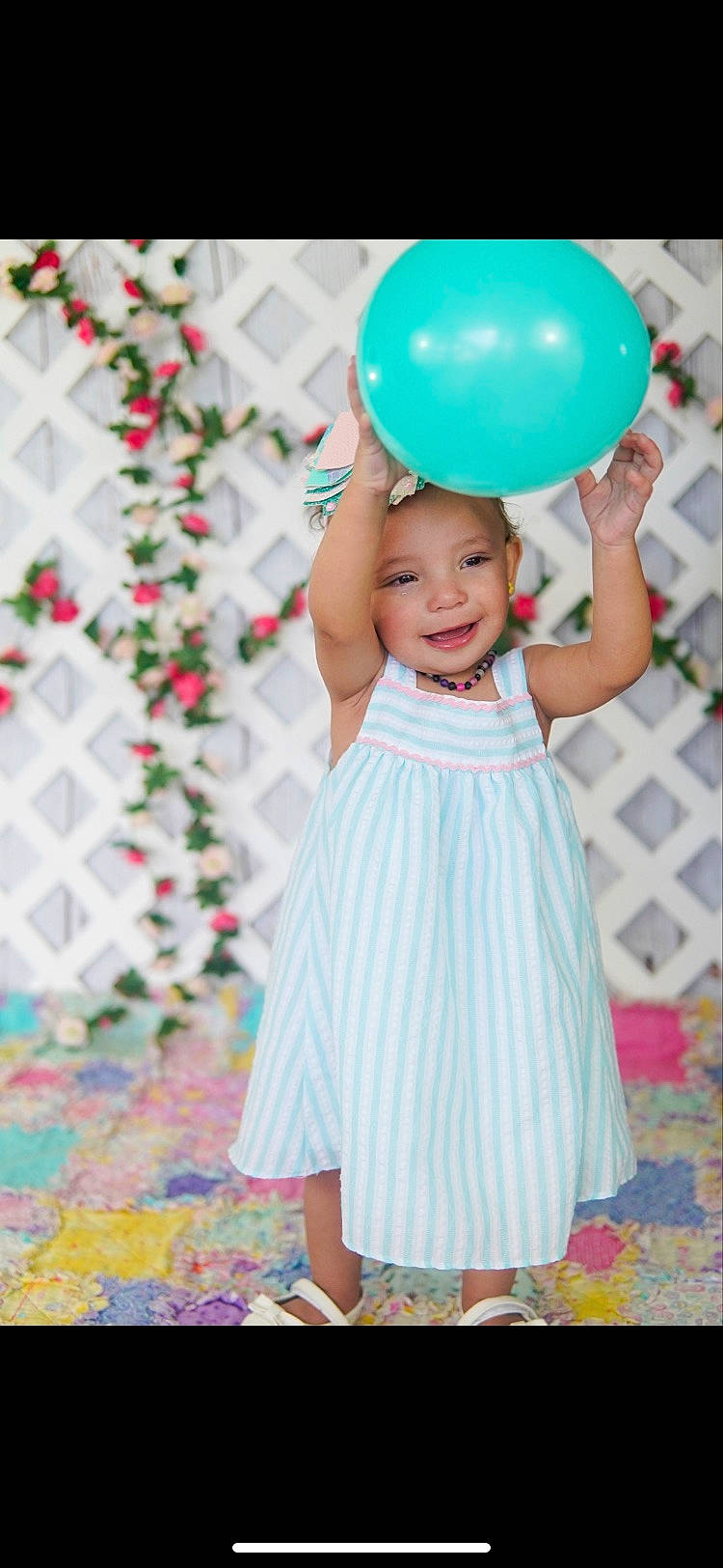 Jaleigha is registered to the contest to win money with this photo: aqua, azure, baby_toddler_clothing, balloon, blue, day_dress, dress, facial_expression, fun, green, happy, headwear, joy, magenta, one_piece_garment, person, pink, product, purple, smile
