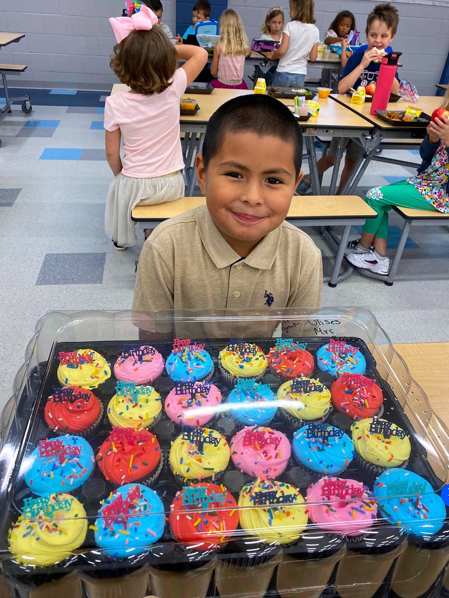 Ulises joined the competition — help win amazing prizes! art, baked_goods, baking, chair, child, clothing, cuisine, desk, event, food, fun, leisure, person, recreation, sharing, smile, sweetness, t_shirt, table, toddler